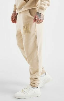 Messi X Sik Silk Béžové Pánské Tepláky 7 Messi X Sik Silk Béžové Pánské Tepláky -MIKINY Prodejní prodejna messi x sik silk beige logo pant 2